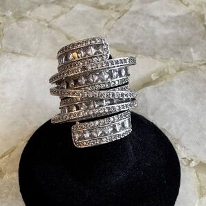 Sterling Silver6.4 CT cubic Zirconia Cocktail Ring.
Measures 1.25” long.Sparkle